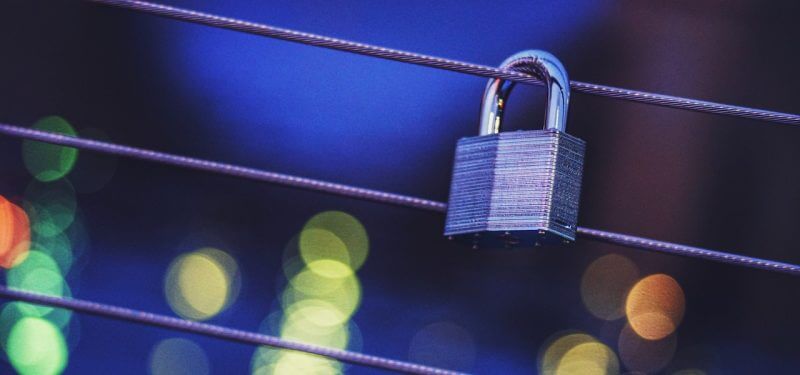 Lock with city lights in background