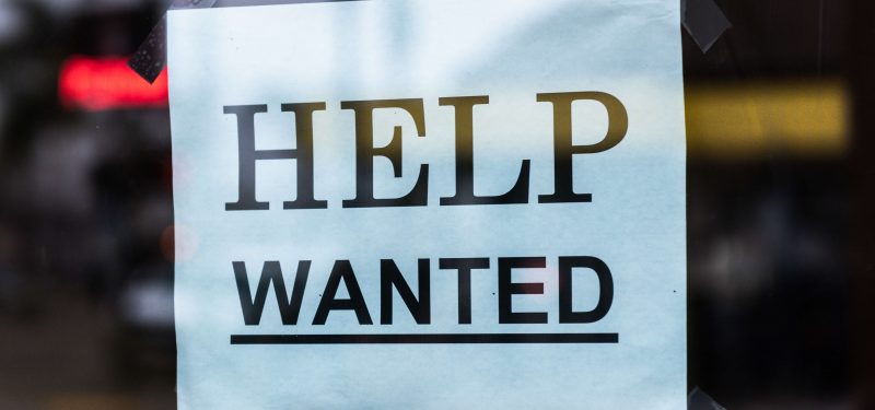 Help Wanted Sign in Window